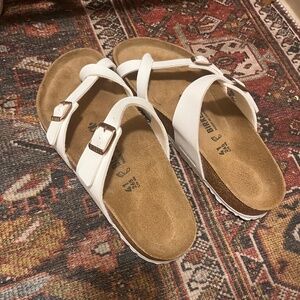 White Birkenstock sandals